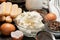 Ingredients for traditional tiramisu cake on wooden background