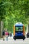 The inhabitants of the city of Toulouse, walk next to a mini electric bus autonomous, on the esplanade Alain Savay. This transport