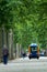 The inhabitants of the city of Toulouse, walk next to a mini electric bus autonomous, on the esplanade Alain Savay. This transport