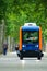 The inhabitants of the city of Toulouse, walk next to a mini electric bus autonomous, on the esplanade Alain Savay. This transport