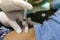 inject drug medicine syringe on hip by hand gloves doctor in act