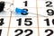 The injection syringe is on a calendar sheet.