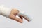 An injured hand with a bandaged pointer finger