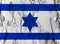 Ink flag of Israel on texture. In March 1949, the Israeli armed forces declared Eilat their territory and raised a flag drawn in