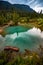 Ink Pots, Banff Alberta. Rain-kissed landscapes come alive in a dance of colors. Verdant meadows and crystal-clear pools blend