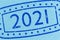 Ink stamp 2021 on blue paper