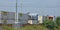 Inland Port Greer cranes tower behind train