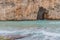 Inland Sea Tunnel connecting a lagoon to the sea, Gozo island, Mal