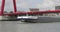 Inland tanker passing under a bridge in Rotterdam