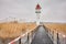 Inland waterway lighthouse seen from a steel pier