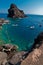 Inlet with boats among the rocks at Santorini