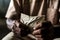 inmate tightly gripping a letter, crumpled edges