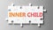 Inner child complex like a puzzle - pictured as word Inner child on a puzzle pieces to show that Inner child can be difficult and