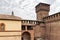 The inner courtyard and the corner tower of the Sforzesco Castle - Castello Sforzesco in Milan, Italy