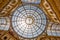 The inner dome of Vittorio Emanuele II Gallery, shopping mall near Duomo Square, Milan, Italy