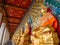 In the inner hallway of Wat Arun, there is a Buddha image on the side of the wall showing the Thai architecture assembly work.