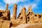 Inner view of a temple and carved pillars of the great hypostyle hall in the Precinct of Amon Re, Situated at Karnak Temple comple