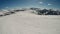 Innerkrems - A panoramic view on the snow covered slopes of Austria. The slopes are ready for skiing. Cloudless, blue sky.