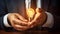 Innovative Concepts: Hand Holding Light Bulb Amid Coins on Desk