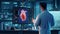 Innovative technology at work: cardiologist analyzes detailed heart hologram in futuristic lab