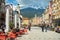 Innsbruck, Austria - April 17th 2021: Lively pedestrian precinct in the historic city centre.