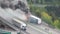 Innsbruck, Austria. Burning truck on the Brenner motorway near the Europa bridge. Highway between Austria and Italy