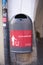 Innsbruck,  Austria - March 20.2019: Trash Can in interesting Design in Austria, series of red signs on bins to encourage