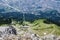 Innsbruck city from above Seegrube station of Nordkette cable car, with winding bike and hike trails. Top view