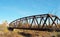 An inoperative road railway bridge requiring restoration and repair in the city of Petrovsk, Russia. A distant view of the