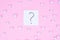 Inquiry concept. Close-up high angle flat lay studio photo of drawn question mark on pastel color soft background and lot of