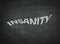 Insanity concept word on a blackboard background