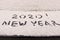 The inscription 2020 on the snow. The inscription on the car. The concept of a New year