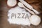 The inscription on the board Pizza