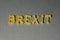 The inscription BREXIT in large letters on a gray background. UK exit from the European Union