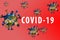 Inscription COVID-19 on red background. World Health Organization WHO introduced new official name for Coronavirus disease named