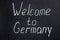 The inscription on the dark banner `Welcome to Germany!`