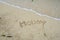 Inscription Holiday on the sand at the beach.