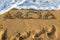 An inscription kreta  on the sand at the beach greece