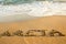 An inscription kreta  on the sand at the beach greece