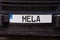 Inscription MELA on car number plate in Maltese language what means OK or alrighty