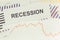 Inscription recessions and downward graphs representing financial crisis caused by coronavirus. Risk of recession around world.