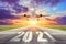 The inscription on the runway 2021 surface of the airport runway with take off airplane. Concept of travel in the new year,