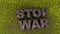 The inscription in rusty letters Stop War on green grass. Russian aggression 3d rendering