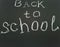 Inscription on shcool blackboard Back to school