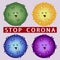 Inscription `stop corona` and colourful dead corona virus