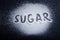 Inscription sugar written in sugar grains