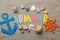 Inscription summer from paper of multi-colored letters and seashells and summer accessories on the sea sand. Summer. relaxation. v