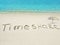 Inscription Timeshare in the sand on a tropical island, Maldives.
