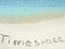 Inscription Timeshare in the sand on a tropical island, Maldives.