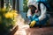 Insect exterminator in work attire, diligently applying pesticide outdoors